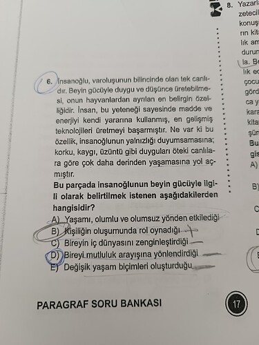 Bu resimde, bir kitap ya da dergide yer alan ve insan beyninin gücü ile ilgili bir metin parçasının yanında yer alan çoktan seçmeli bir soru ve cevap şıkları bulunmaktadır. (Captioned by AI)